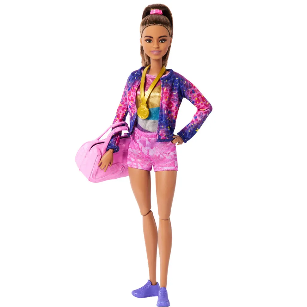 Barbie ® Gymnastic Playset with Brunette Gymnast Doll, C-Clip for Flipping Action, Balance Beam, Warm-Up Suit & Accessories Fashion